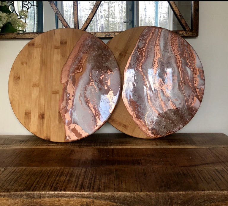 Round copper and white cheese boards with clear quartz