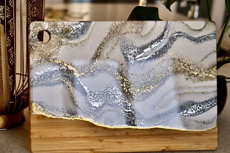 Silver and gold cheese board